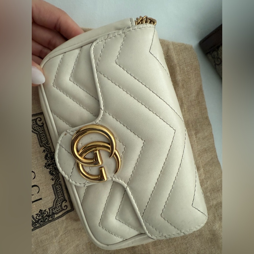 Authentic Gucci Cream with Gold Hardware